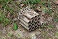 Amateur pyrotechnics fireworks box with sixteen shots discarded in nature after use Royalty Free Stock Photo