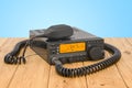 Amateur radio transceiver with push-to-talk microphone switch on the wooden planks, 3D rendering Royalty Free Stock Photo