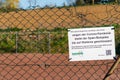 Amateur soccer field closed due to corona virus, covid-19 pandemic. Governmental action for infection prevention. German sign.