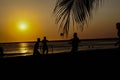 Amateurs playing football at Jumeira beach in Santa Marta, Colombia during sunset