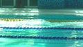 Amator female athlete doing butterfly stroke during training in indoor swimming pool, Slow motion, Full HD steady shot