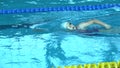 Amator Swimmer Practicing in Water Swimming pool.