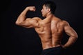 Amature bodybuilder showing his strong arms Royalty Free Stock Photo
