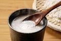 Amazake and a wooden spoon on the table