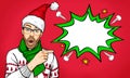 Amazed bearded man in glasses and Santa hat with open mouth stares aside, shows something strange and unexpected.