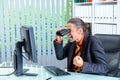 Amazed business man looking with binoculars at the screen Royalty Free Stock Photo