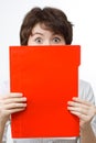 Amazed businesswoman with red file. Royalty Free Stock Photo
