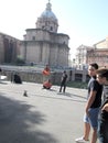 Amazed children looking at Hindu street performers in curious position Rome Europe