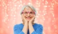 Amazed funny senior woman with big party glasses Royalty Free Stock Photo