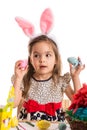 Amazed girl with Easter eggs
