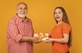amazed kid and granddad with present box for anniversary Royalty Free Stock Photo