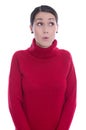 Amazed looking young woman in red pullover - isolated over white