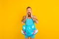 Amazed man with inflatable donut with elephant is ready to swim Royalty Free Stock Photo