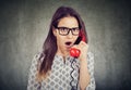 Amazed shocked woman talking on a telephone Royalty Free Stock Photo