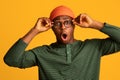 Amazed Shocked Young Black Guy Touching Glasses And Opening Mouth In Surprise Royalty Free Stock Photo