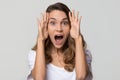 Amazed surprised woman feeling excited screaming looking at camera Royalty Free Stock Photo