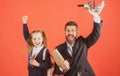 Amazed teacher with excited happy pupil school girl. First day at school. Father and little child school girl in first Royalty Free Stock Photo