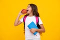 Amazed teen girl. Schoolgirl in school uniform hold apple. School and education concept. Back to school. Schoolchild Royalty Free Stock Photo