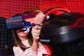 amazed teenage girl racing in vr