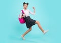 Amazed teenager. School girl in school uniform with backpack. Teenage girl student on blue isolated background. Learning