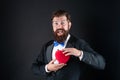 amazed tuxedo man with beard hold romantic love heart, happy valentines day Royalty Free Stock Photo