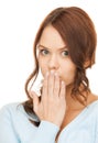 Amazed woman with hand over mouth Royalty Free Stock Photo