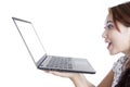 Amazed woman with laptop computer Royalty Free Stock Photo