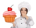 Amazed Woman Pastry Chef Holding Huge Cupcake Royalty Free Stock Photo