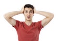 Amazed young man hand holding head Royalty Free Stock Photo