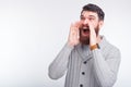 Young man is shouting some good news or promotion.