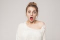 Amazement blonde open mouth and scream with surprised face. Royalty Free Stock Photo