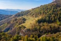 Autumn view of a mountain meadows and forests