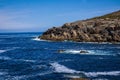 Amazing aerial shot of a rocky beach on a blue sky background Royalty Free Stock Photo