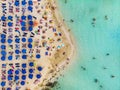 Amazing Aerial View from Above over Nissi Beach in Cyprus. Nissi Beach At high tide. Tourists relax on the beach. Crowded beach