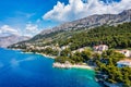 Amazing aerial view of the beautiful Podrace beach in Brela, Makarska Riviera, Croatia. Aerial view of Podrace beach and Royalty Free Stock Photo