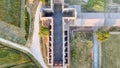 Amazing aerial view of beautiful San Galgano Abbey with roofless walls, Tuscany Hills in spring season, Italy Royalty Free Stock Photo