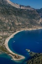 Amazing aerial view of Blue Lagoon in beach resort in the Fethiye district - Oludeniz.  Turkey. Summer landscape with mountains, g Royalty Free Stock Photo