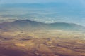 Amazing aerial view of desert, stone hills, and distant mountains layers range.Wilderness background. Near Mount Erciyes. Kayseri, Royalty Free Stock Photo