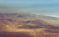 Amazing aerial view of desert, stone hills, and distant mountains layers range.Wilderness background. Near Mount Erciyes. Kayseri, Royalty Free Stock Photo