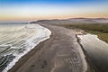 Amazing aerial view of a dreamlike beach in the central Chilean coast. Striking view of the waves coming from the sea and the wild Royalty Free Stock Photo