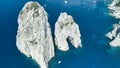 Amazing aerial view of Faraglioni in summer season. Rock natural formations in Capri Island, Italy