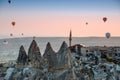 Amazing aerial view of hot air balloons at sunrise in Goreme National Park.Uchisar Castle. Cappadocia.Turkey. Royalty Free Stock Photo