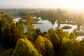 Amazing aerial view of Kirkilai karst lakes and lookout tower in the bright sunny autumn morning, Birzai, Lithuania