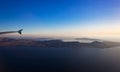 Aerial view of Santorini island as seen from plane window Royalty Free Stock Photo