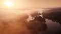 Amazing aerial view on sunrise. foggy river and golden  trees. beautiful autumn landscape. drone shot, bird`s eye Royalty Free Stock Photo