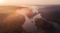 Amazing aerial view on sunrise. foggy river and golden  trees. beautiful autumn landscape. drone shot, bird`s eye Royalty Free Stock Photo