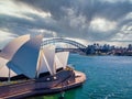 Amazing aerial view of Sydney city, the harbor bridge and the modern building of the Opera house Royalty Free Stock Photo