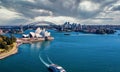 Amazing aerial view of Sydney city, the harbor bridge and the modern building of the Opera house Royalty Free Stock Photo