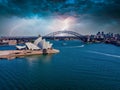 Amazing aerial view of Sydney city, the harbor bridge and the modern building of the Opera house Royalty Free Stock Photo