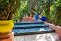 Amazing alley in Majorelle garden with famous moroccan tiles in Marrakesh , Morocco